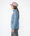 on-model image of strafe outerwear fall/winter 23/24 collection womens basecamp full zip baselayer in storm cloud blue