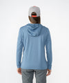 on-model image of strafe outerwear fall/winter 23/24 collection womens basecamp full zip baselayer in storm cloud blue