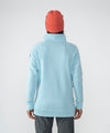 on-model image of strafe outerwear fall/winter 23/24 collection womens tech wrap collar mid-layer in arctic blue