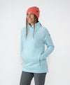 on-model image of strafe outerwear fall/winter 23/24 collection womens tech wrap collar mid-layer in arctic blue