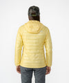 on-model image of strafe outerwear fall/winter 23/24 collection womens aero insulator in lemon