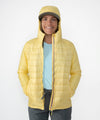 on-model image of strafe outerwear fall/winter 23/24 collection womens aero insulator in lemon