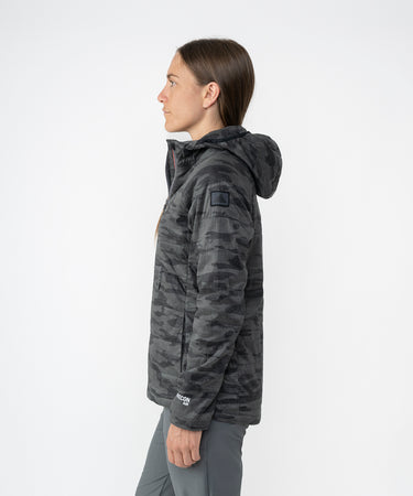 on-model image of strafe outerwear fall/winter 23/24 collection womens sunnyside pullover in distressed stealth camo