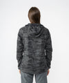 on-model image of strafe outerwear fall/winter 23/24 collection womens sunnyside pullover in distressed stealth camo