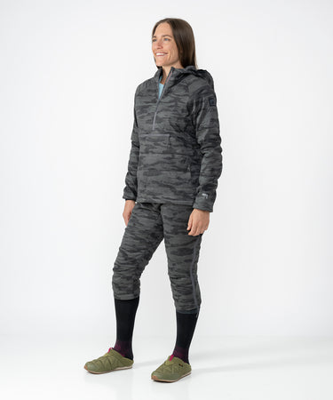 on-model image of strafe outerwear fall/winter 23/24 collection womens sunnyside pullover in distressed stealth camo