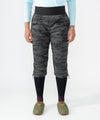 on-model image of strafe outerwear fall/winter 23/24 collection womens alpha insulator pant in distressed stealth camo