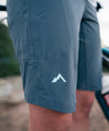 lifestyle image of strafe outerwear summer 2023 ws ridgeline short in charcoal