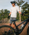lifestyle image of strafe outerwear summer 2023 ms ridgeline short in charcoal