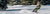 snowboarder on groomer
