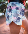 lifestyle image of strafe outerwear summer 2023 ws training short in tropical dreams