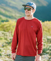 lifestyle image of strafe outerwear summer 2023 ms spring baselayer ls in pinot
