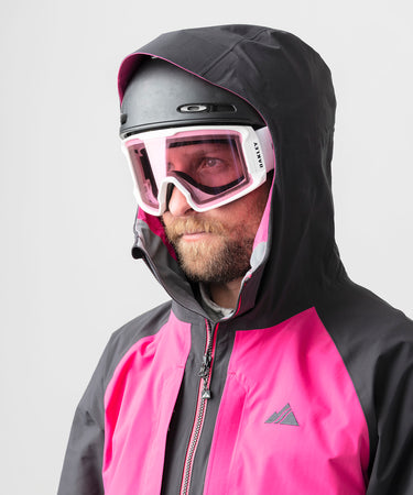 studio on-model image of strafe outerwear 2023 nomad 3l shell jacket in fuchsia color