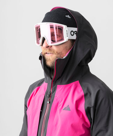 studio on-model image of strafe outerwear 2023 nomad 3l shell jacket in fuchsia color