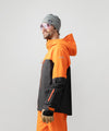 studio image of strafe outerwear 2023 cham 3l shell jacket in tangerine color