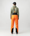 studio image of strafe outerwear 2023 cham 3l shell pant in tangerine color