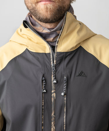 studio on-model image of strafe outerwear 2023 ms sickbird 3l shell suit in dune color
