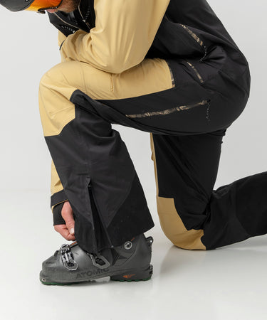 studio on-model image of strafe outerwear 2023 ms sickbird 3l shell suit in dune color