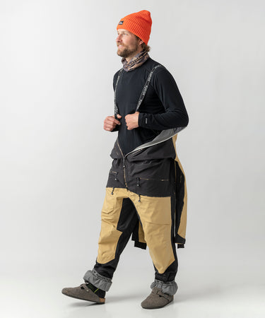 studio on-model image of strafe outerwear 2023 ms sickbird 3l shell suit in dune color