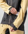 studio on-model image of strafe outerwear 2023 ms sickbird 3l shell suit in dune color