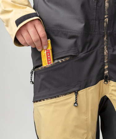 studio on-model image of strafe outerwear 2023 ms sickbird 3l shell suit in dune color