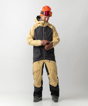 studio on-model image of strafe outerwear 2023 ms sickbird 3l shell suit in dune color