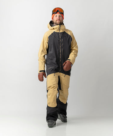 studio on-model image of strafe outerwear 2023 ms sickbird 3l shell suit in dune color