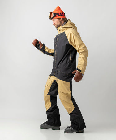 studio on-model image of strafe outerwear 2023 ms sickbird 3l shell suit in dune color