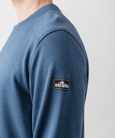 studio on-model image of strafe outerwear 2023 ms tech crew in deep navy color