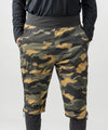 studio on-model image of strafe outerwear 2023 ms alpha insulator short in dune camo color