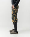 studio on-model image of strafe outerwear 2023 ms alpha insulator short in dune camo color