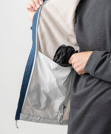 studio on-model image of strafe outerwear 2023 ms alpha direct vest in frost grey color