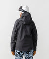 studio on-model image of strafe outerwear 2023 meadow 3l shell jacket in black color