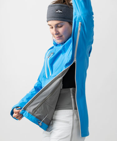 studio on-model image of strafe outerwear 2023 lynx 3l shell pullover in cobalt color