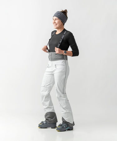 studio on-model image of strafe outerwear 2023 willow 3l shell half bib in frost grey color