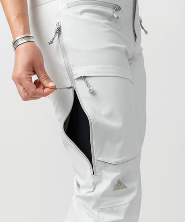 studio on-model image of strafe outerwear 2023 willow 3l shell half bib in frost grey color
