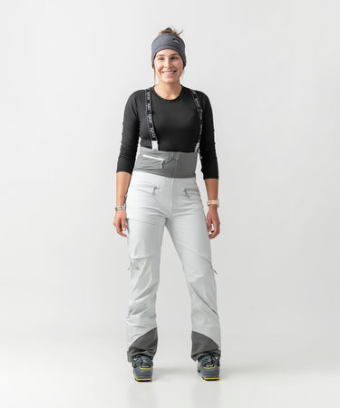 studio on-model image of strafe outerwear 2023 willow 3l shell half bib in frost grey color
