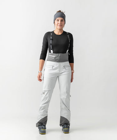 studio on-model image of strafe outerwear 2023 willow 3l shell half bib in frost grey color