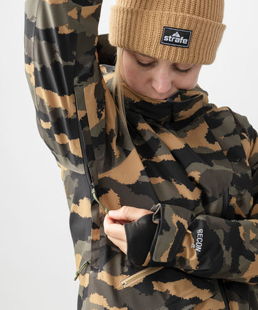 studio image of strafe outerwear 2023 lucky 2l insulated jacket in dune camo color