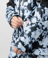 studio on-model image of strafe outerwear 2023 strafe x shredly meadow jacket in tie dye splatter color