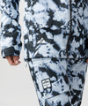 studio on-model image of strafe outerwear 2023 strafe x shredly meadow jacket in tie dye splatter color