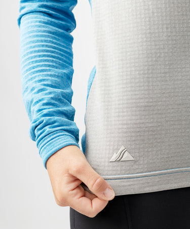 studio on-model image of strafe outerwear 2023 ws basecamp hoodie in cobalt color