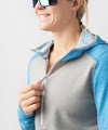 studio on-model image of strafe outerwear 2023 ws basecamp hoodie in cobalt color