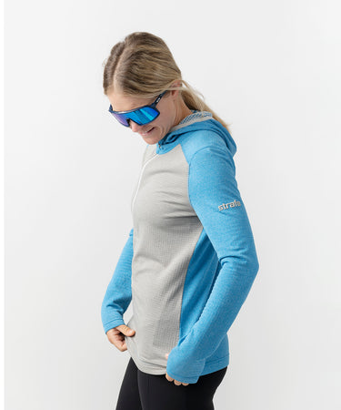 studio on-model image of strafe outerwear 2023 ws basecamp hoodie in cobalt color