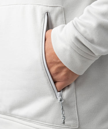studio on-model image of strafe outerwear 2023 ws tech hoodie in frost grey color