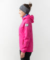 studio on-model image of strafe outerwear 2023 ws sunnyside alpha anorak in fuchsia color